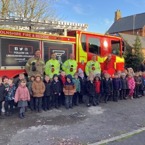 Leverton Fire and Rescue Team visiting the Reception children with their fire engine  