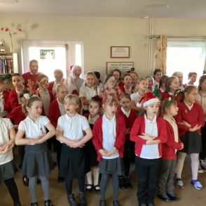 School choir singing at the Evergreens